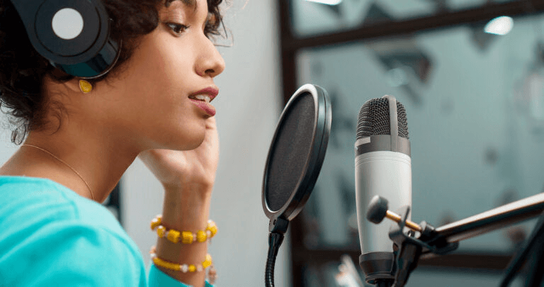 Confident voice actor in studio with microphone